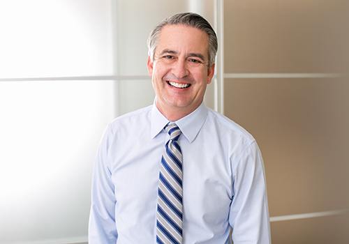 Smiling businessman in office